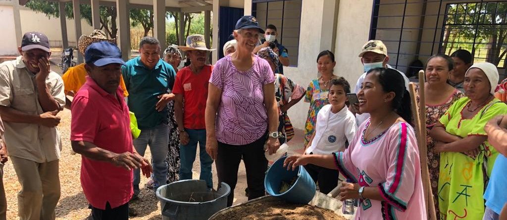 Farmer-to-Farmer Volunteer works with community members in Colombia.